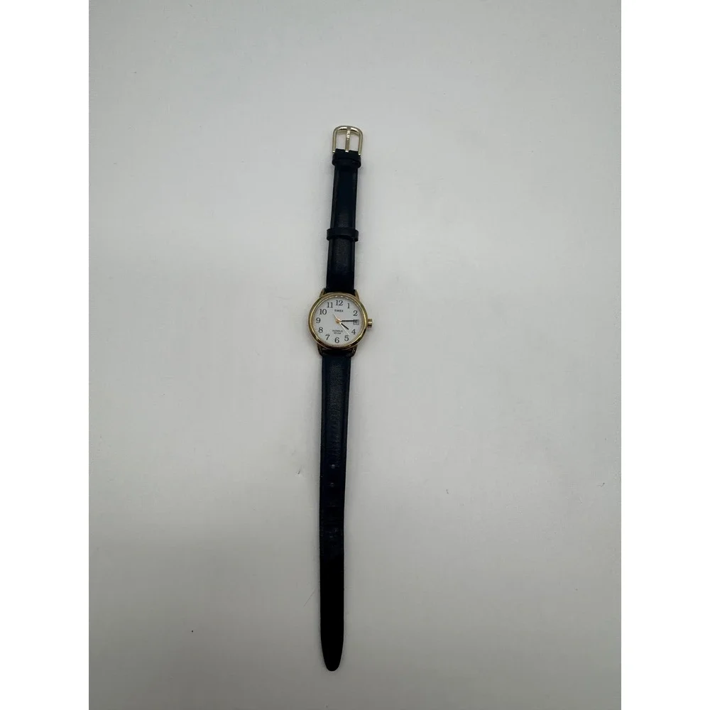 Timex Indiglo WR 30M Gold Tone White Dial Black Leather Watch CR 1216 needs bat